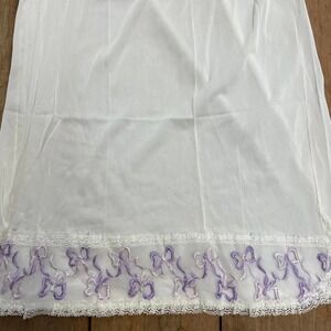 Vintage ladies long half slip with purple bow embroidered detail